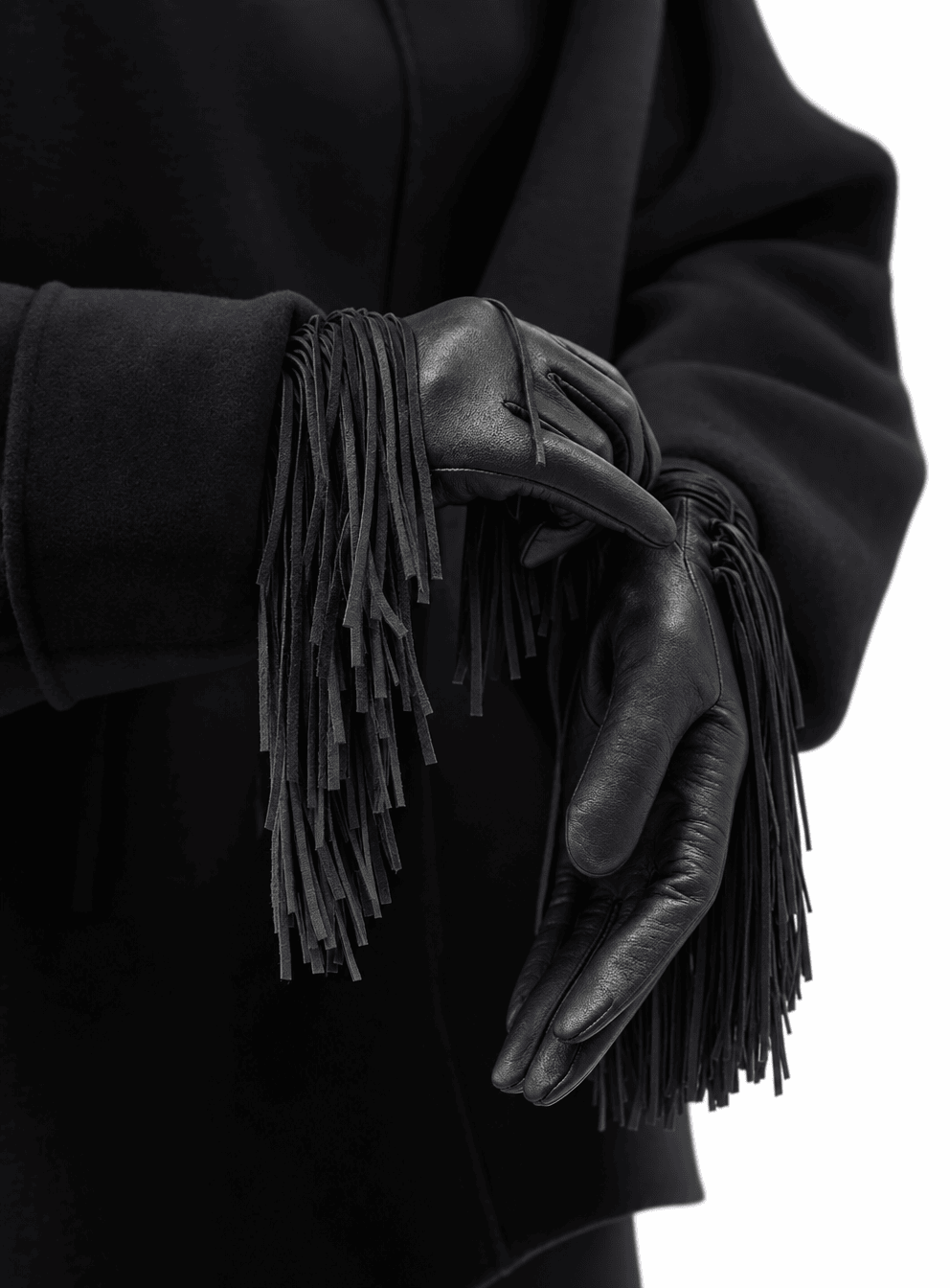 black nappa leather gloves with a long black fringe, worn