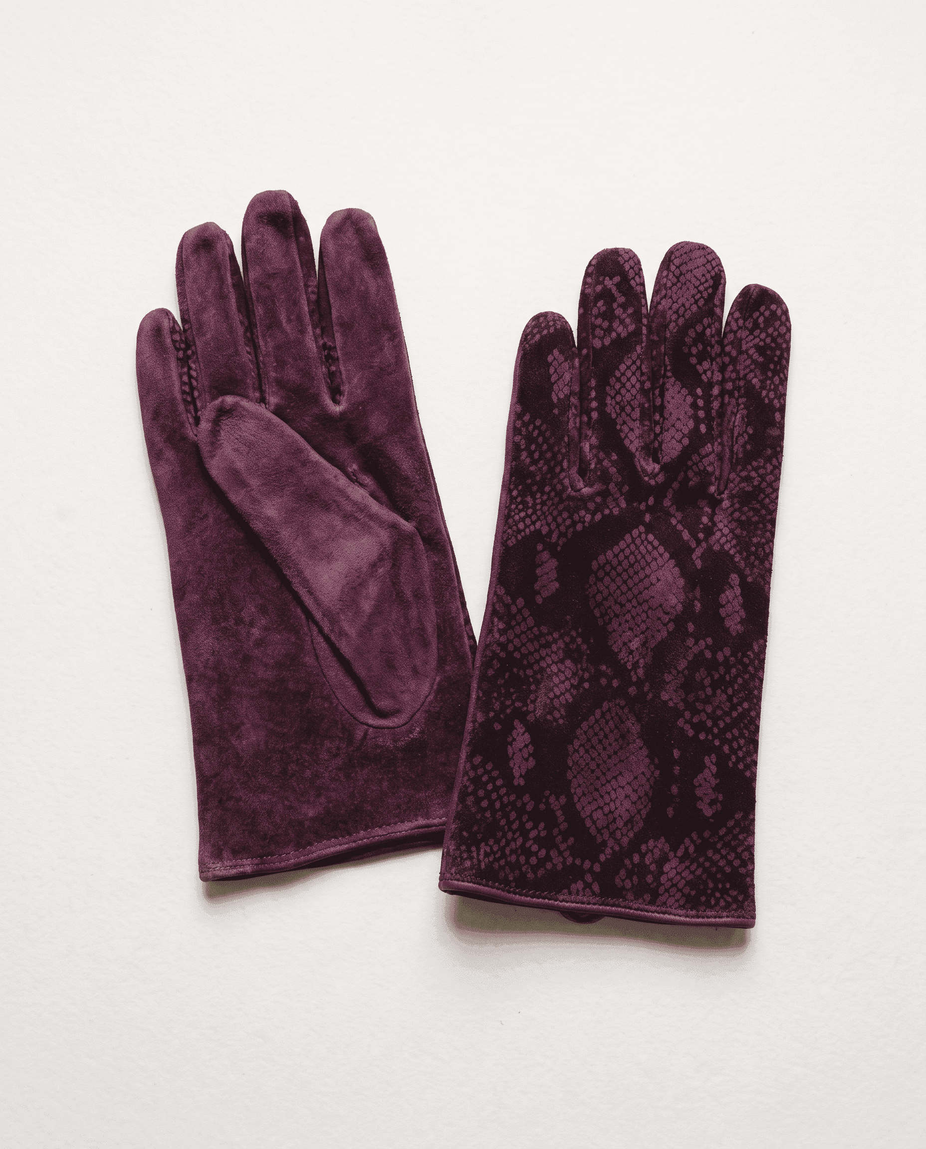 plum suede gloves with a python print, palm side