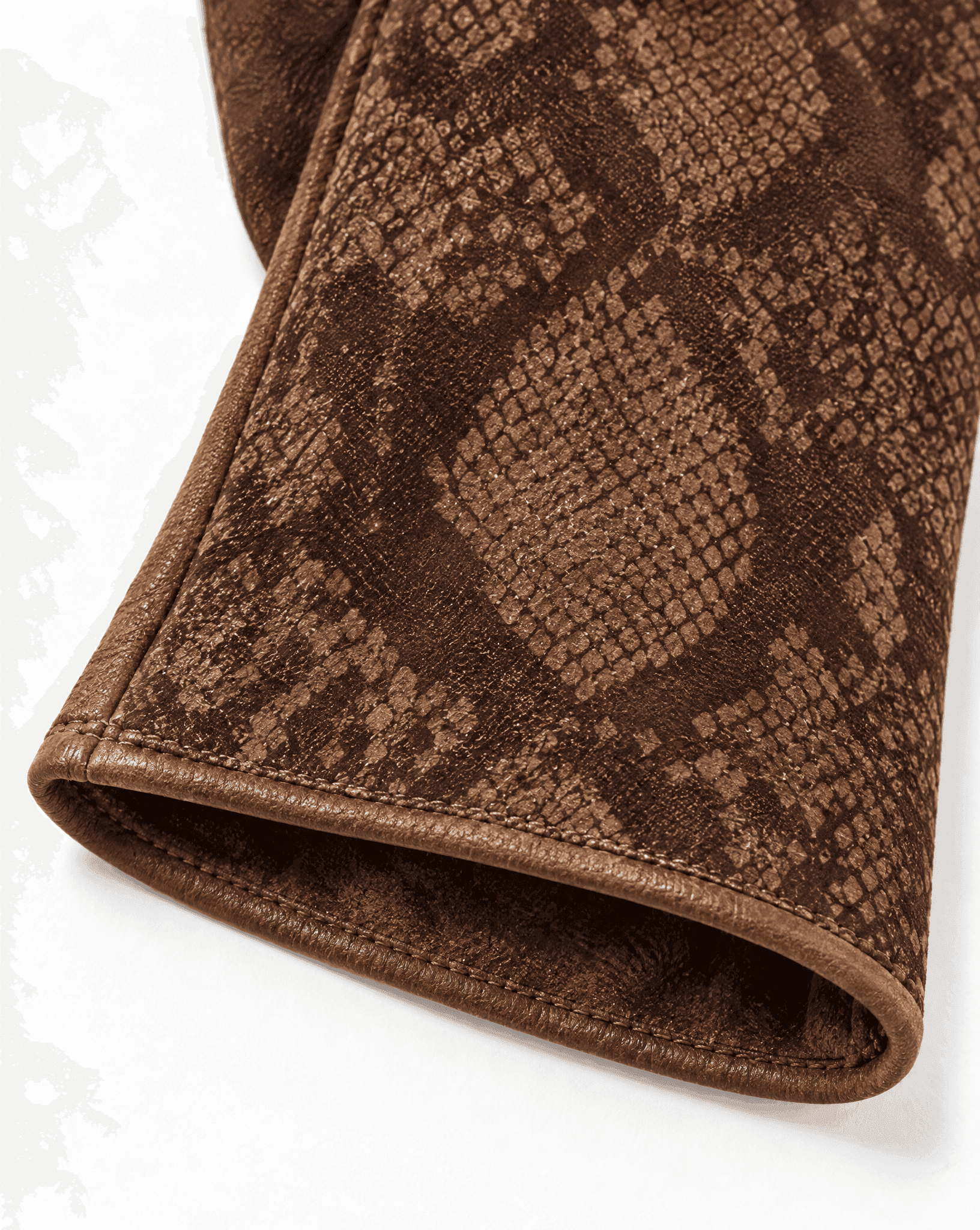 brown suede gloves with a python print, detail